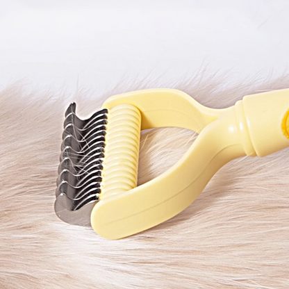 🥳2026 HOT SALE🥳💞50K+ SOLD!🐕💨50% OFF! Dual-Sided Pet Grooming Rake – 9-tooth for mats, 17-tooth for shedding. Skin-safe rounded teeth, ergonomic grip. Less mess, more cuddles. ✨🧡